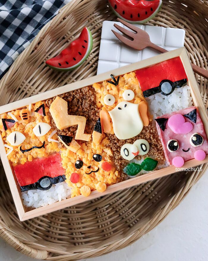 Creative lunchbox featuring colorful, character-themed designs by a talented Japanese artist.