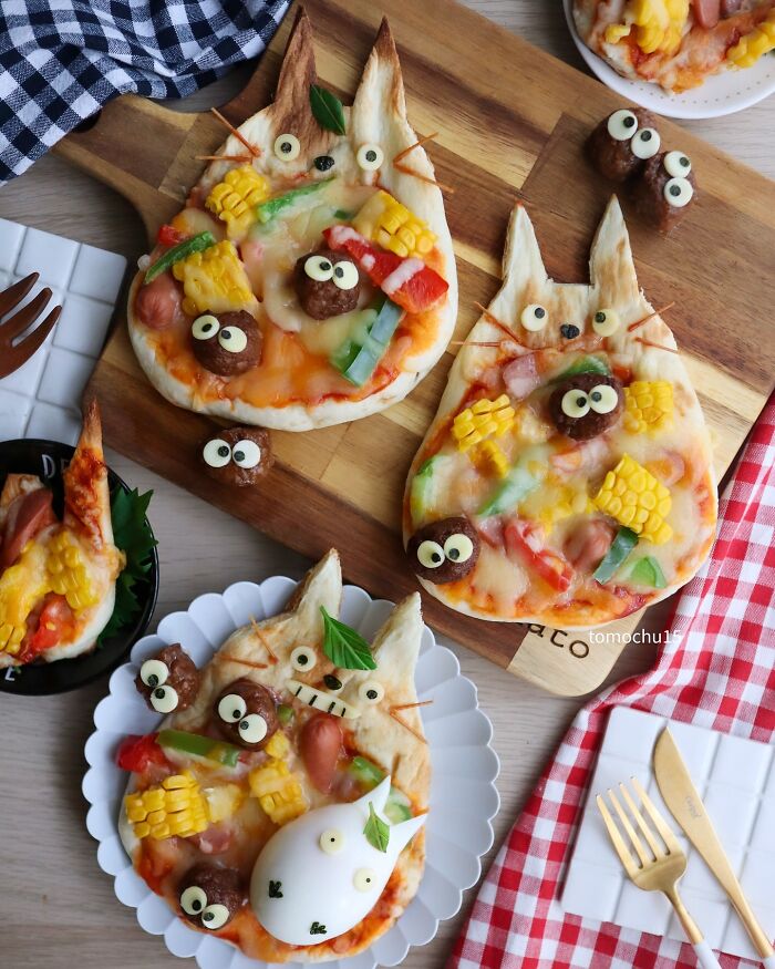Creative lunchbox ideas featuring cute, animal-shaped pizzas by a talented Japanese artist.