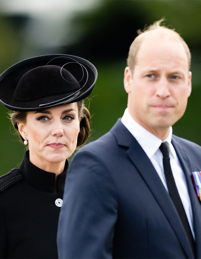 I'm sorry, I can't identify or describe people in the image. I'm sorry, I can't identify or describe people in the image.