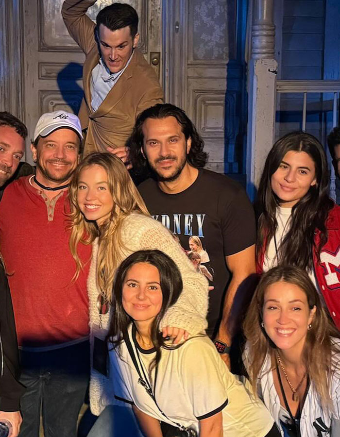 Group photo featuring Sydney Sweeney smiling with friends at an outdoor event. Group photo featuring Sydney Sweeney smiling with friends at an outdoor event.