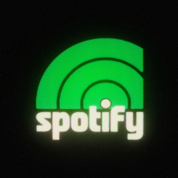 Retro 80s twist on Spotify logo with green arcs on black background.