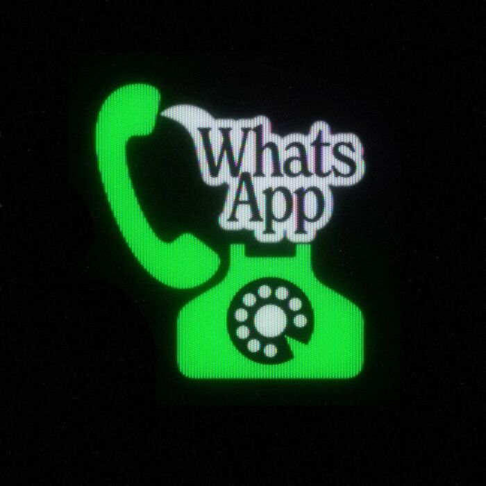 Retro 80s twist on WhatsApp logo, featuring a vintage rotary phone in green.