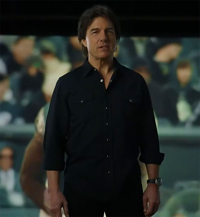 Actor in dark shirt during Super Bowl 2025 ad, sparking discussion about his appearance. Actor in dark shirt during Super Bowl 2025 ad, sparking discussion about his appearance.