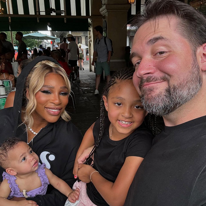 Family enjoying a day out, capturing smiles and togetherness in a lively outdoor setting. Family enjoying a day out, capturing smiles and togetherness in a lively outdoor setting.