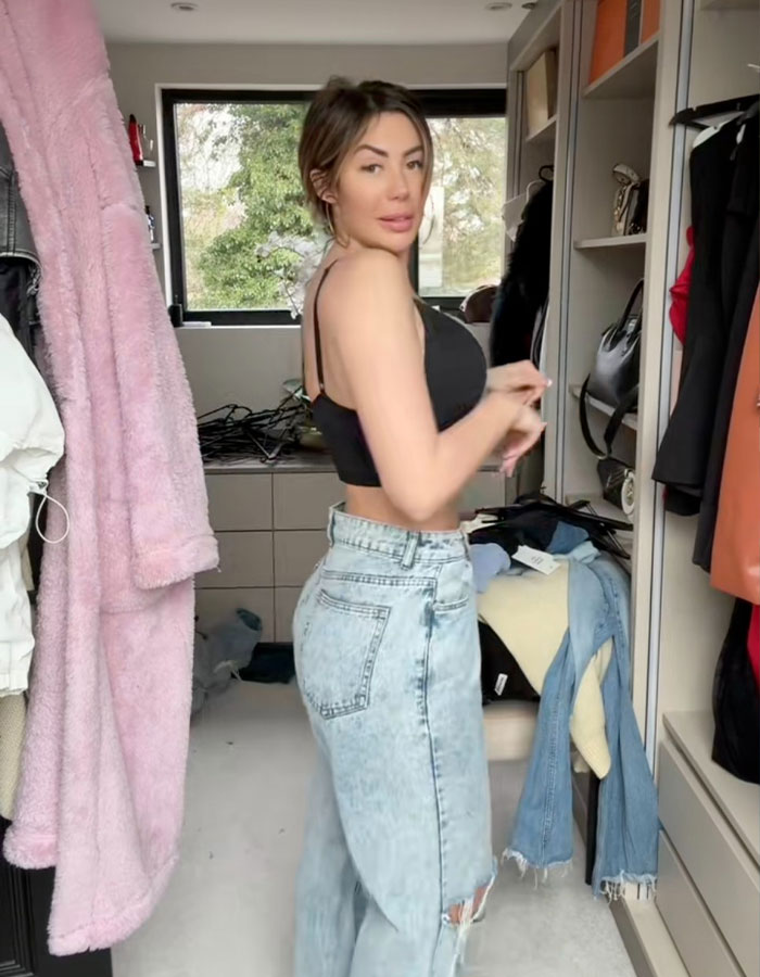 Woman showing new figure after BBL removal in a casual setting, highlighting transformation and recovery journey. Woman showing new figure after BBL removal in a casual setting, highlighting transformation and recovery journey.