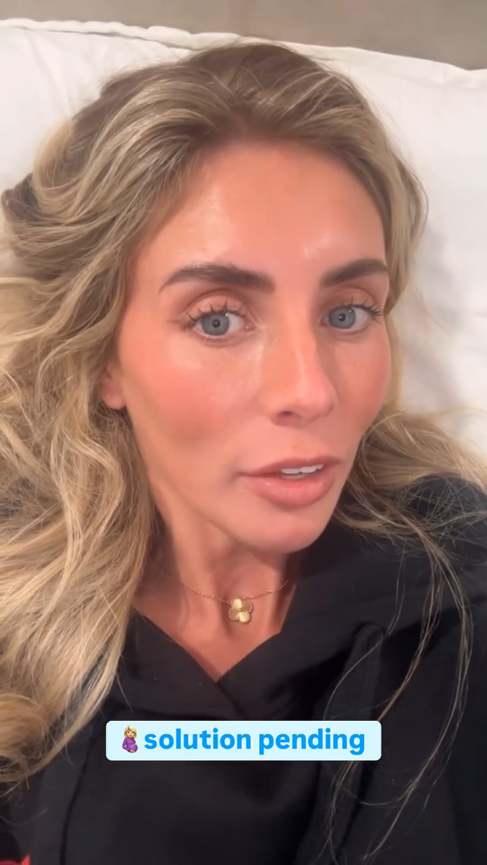 Bonnie Blue with long hair lying down, wearing a black hoodie. Bonnie Blue with long hair lying down, wearing a black hoodie.