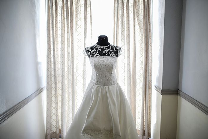 Wedding dress displayed on a mannequin, featured in a story about a bride's dress choice and family dispute. Wedding dress displayed on a mannequin, featured in a story about a bride's dress choice and family dispute.