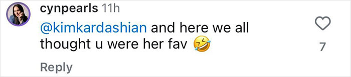 Instagram comment mentioning Kim Kardashian with a lighthearted emoji. Instagram comment mentioning Kim Kardashian with a lighthearted emoji.