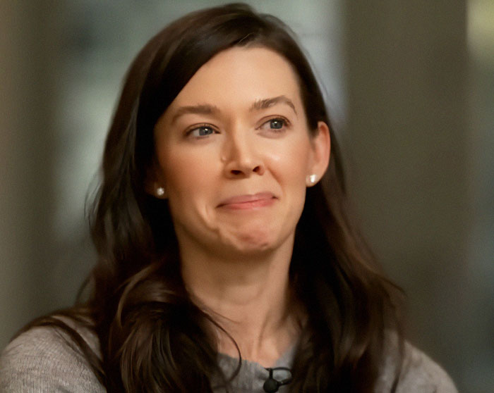 Woman smiling subtly, representing autism breakthrough discussions related to inexpensive treatments. Woman smiling subtly, representing autism breakthrough discussions related to inexpensive treatments.