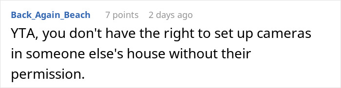 Comment criticizing a woman setting up a camera, discussing privacy concerns. Comment criticizing a woman setting up a camera, discussing privacy concerns.