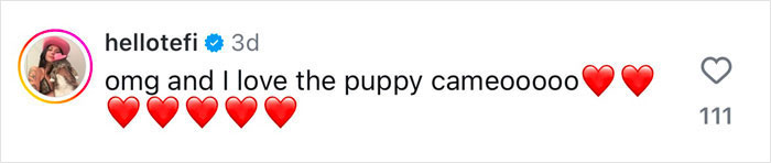 Comment praising puppy photo bomb with emoji hearts. Comment praising puppy photo bomb with emoji hearts.