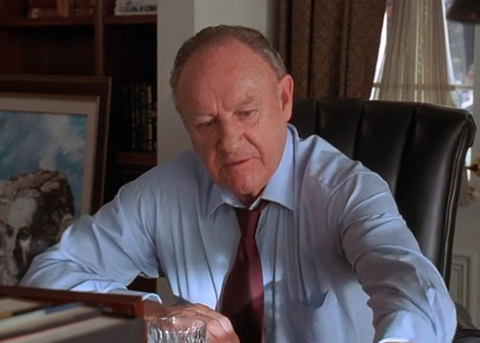 Gene Hackman wearing formal outfit in a movie scene. Gene Hackman wearing formal outfit in a movie scene.