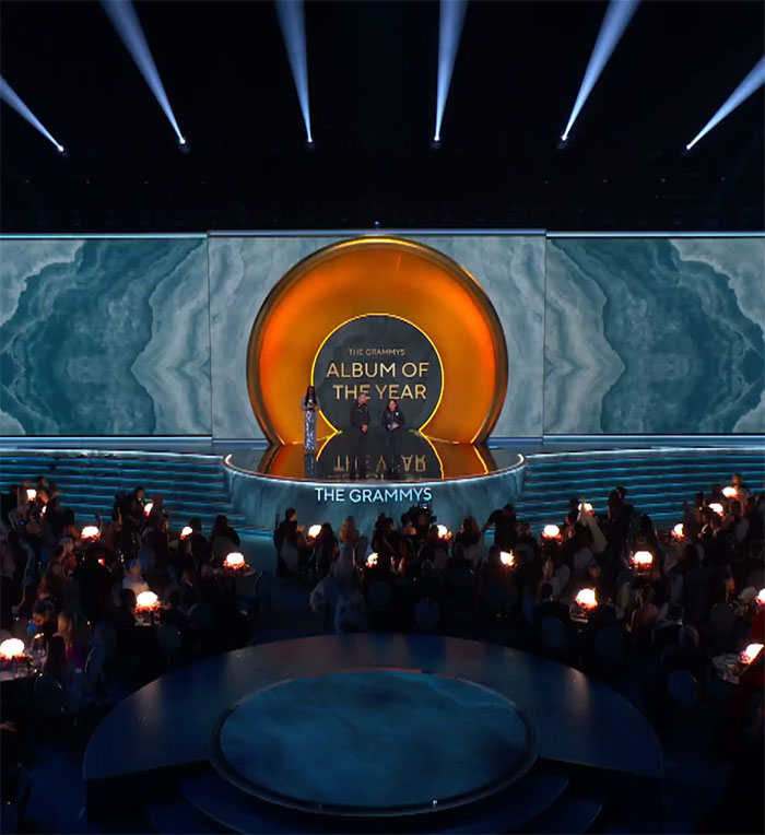 Grammys stage set for Album of the Year, highlighting dress code issues with "bare fleshy under curves" restriction. Grammys stage set for Album of the Year, highlighting dress code issues with "bare fleshy under curves" restriction.