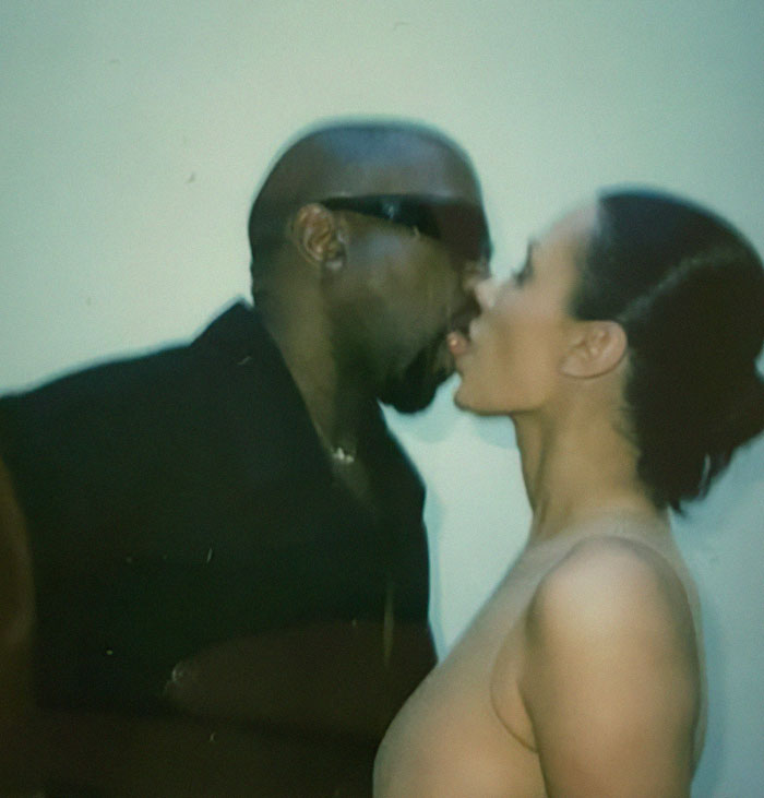 Two people embracing closely, sharing an intimate moment during Bianca Censori’s afterparty. Two people embracing closely, sharing an intimate moment during Bianca Censori’s afterparty.