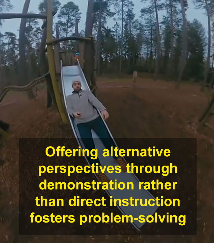Child on slide with adult, illustrating negative reinforcement in parenting to help kids overcome fears. Child on slide with adult, illustrating negative reinforcement in parenting to help kids overcome fears.