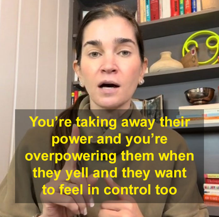 Parenting coach sharing advice on a video call, with a bookshelf in the background, emphasizing the impact of yelling. Parenting coach sharing advice on a video call, with a bookshelf in the background, emphasizing the impact of yelling.