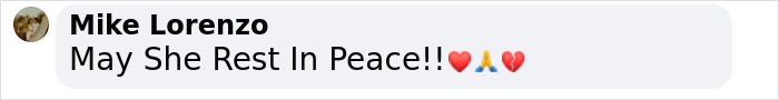 Comment saying 'May She Rest In Peace' with heart and prayer emojis, related to Michelle Trachtenberg. Comment saying 'May She Rest In Peace' with heart and prayer emojis, related to Michelle Trachtenberg.
