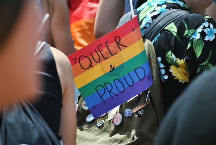 Pride flag with "Queer & Proud" at a science museum event amid backlash over alleged anti-LGBT claims. Pride flag with "Queer & Proud" at a science museum event amid backlash over alleged anti-LGBT claims.