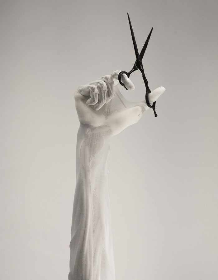 Humanoid robot hand with lifelike muscles holding scissors, illustrating advanced technology. Humanoid robot hand with lifelike muscles holding scissors, illustrating advanced technology.