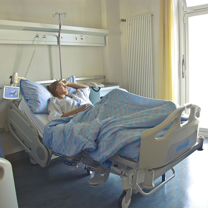 A patient in a hospital bed, linked to discussion on Covid vaccines and new syndrome. A patient in a hospital bed, linked to discussion on Covid vaccines and new syndrome.