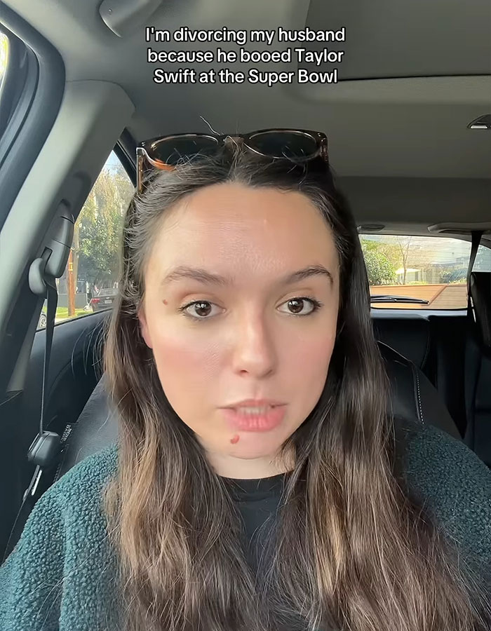 Woman in car discussing divorce over husband booing Taylor Swift at Super Bowl. Woman in car discussing divorce over husband booing Taylor Swift at Super Bowl.