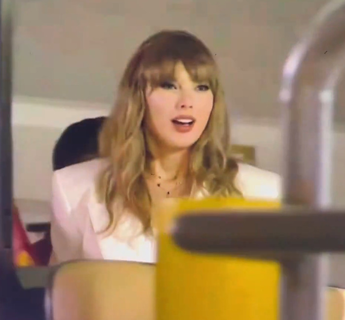 Taylor Swift in a white outfit at the Super Bowl. Taylor Swift in a white outfit at the Super Bowl.