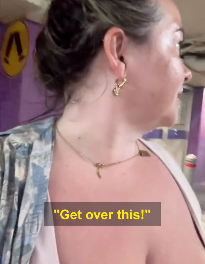 Woman responds to strangers staring at her G-cup breasts with confidence. Woman responds to strangers staring at her G-cup breasts with confidence.