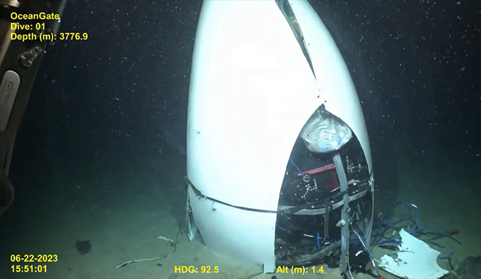 Damaged Titan Submarine at ocean floor, highlighting disaster evidence. Damaged Titan Submarine at ocean floor, highlighting disaster evidence.