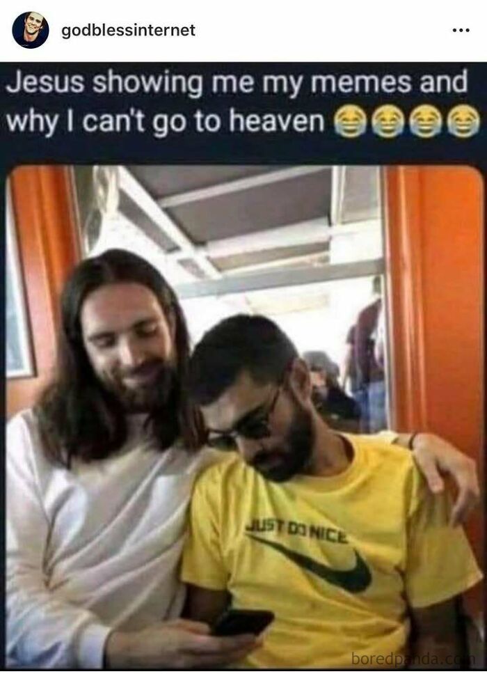 Two people on a bench, one showing memes to the other, with the text above referencing "God Bless Internet."