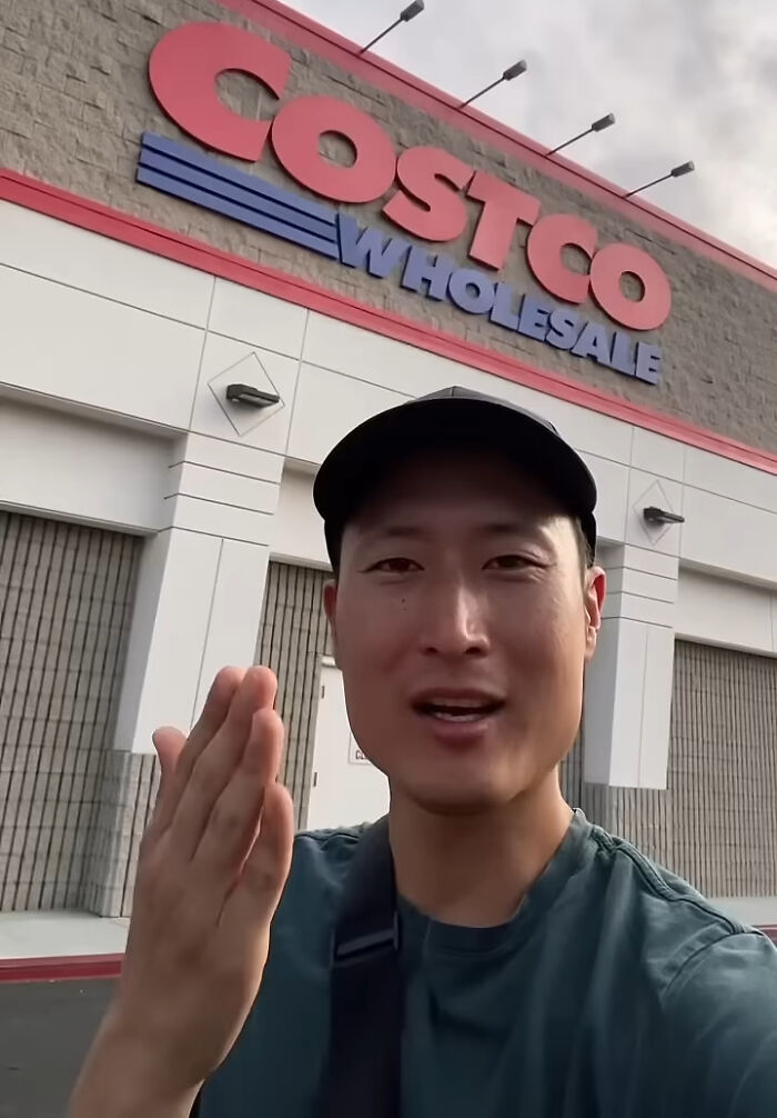 Person sharing Costco shopping hacks outside a Costco store. Person sharing Costco shopping hacks outside a Costco store.