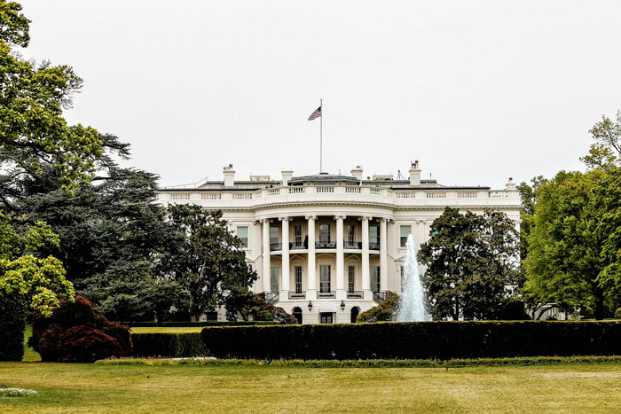 White House exterior, lush garden, central fountain; related to the Black Hawk conspiracy and DC plane crash drill. White House exterior, lush garden, central fountain; related to the Black Hawk conspiracy and DC plane crash drill.