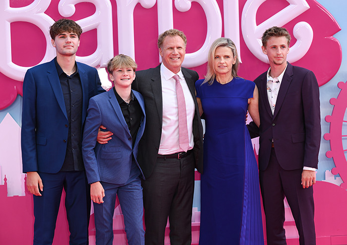 Will Ferrell and his family in formal attire at a pink-themed event, smiling for the camera. Will Ferrell and his family in formal attire at a pink-themed event, smiling for the camera.