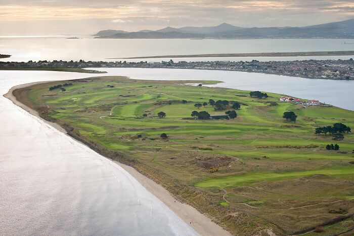 A breathtaking coastal golf course with rolling greens and scenic ocean views.
