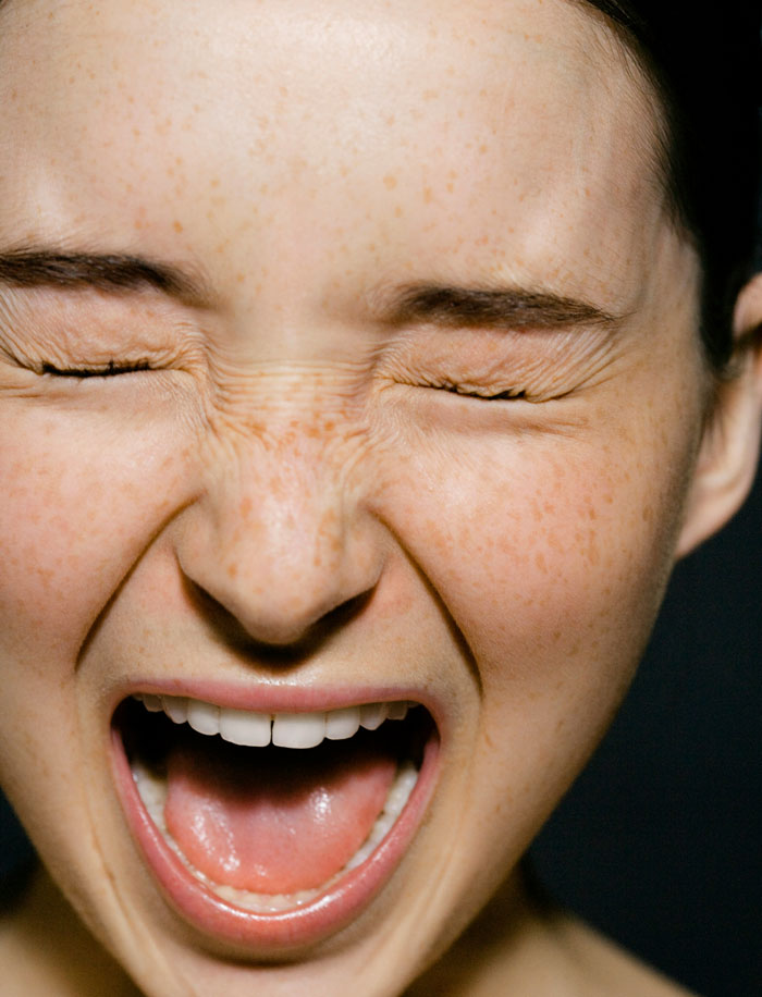 Close-up of a person with eyes shut and mouth open, appearing distressed, highlighting life-saving facts.