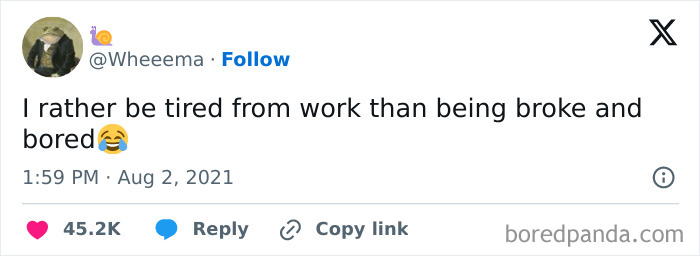 Tweet screenshot about preferring work exhaustion over being broke and bored, with a laughing emoji.