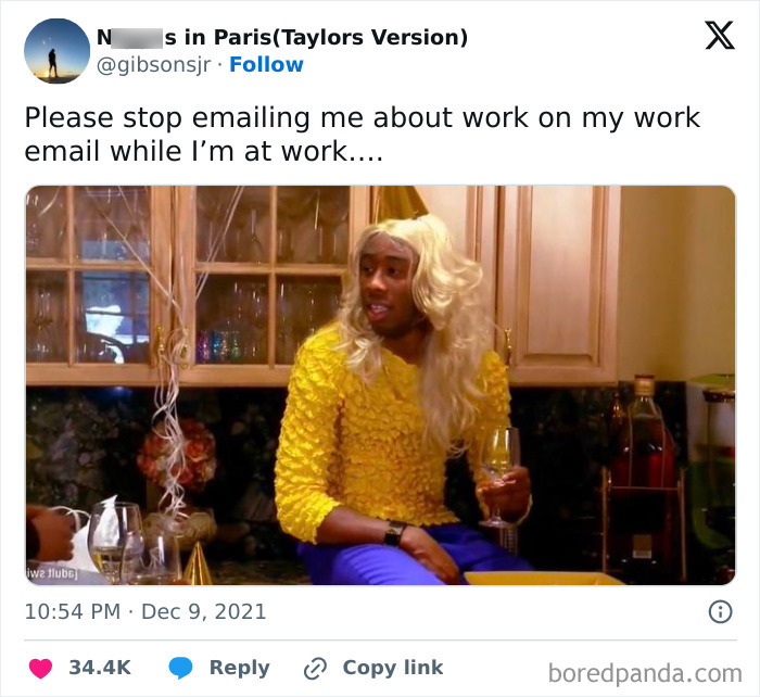 Person in a humorous yellow outfit holding a wine glass, surrounded by party decor, showcasing work-email-jokes theme.