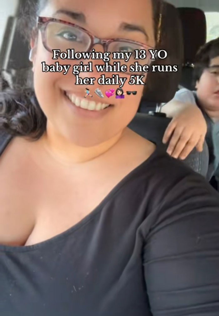 Mom supporting daughter during her 5K run, smiling in a car selfie. Mom supporting daughter during her 5K run, smiling in a car selfie.