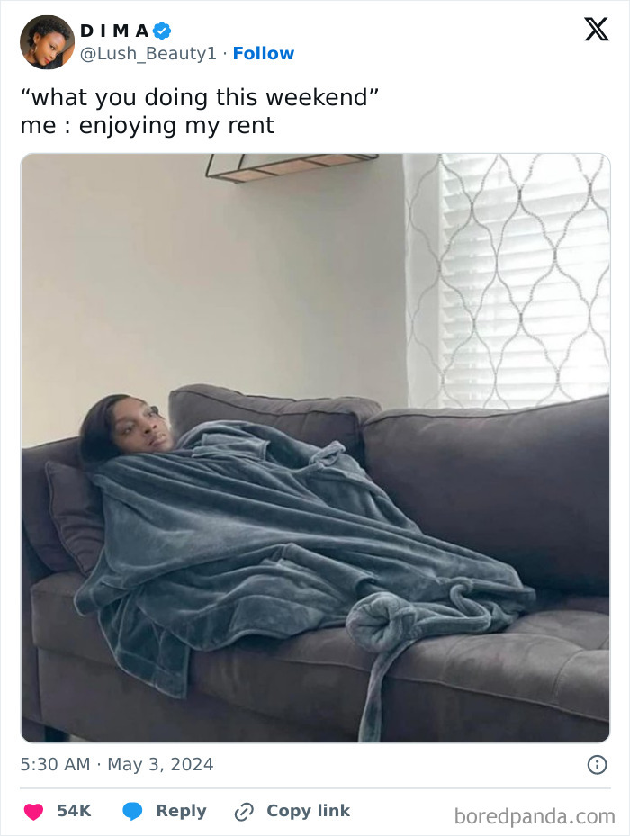 Woman wrapped in a blanket on the couch with text about enjoying rent, reflecting funny women’s humor.