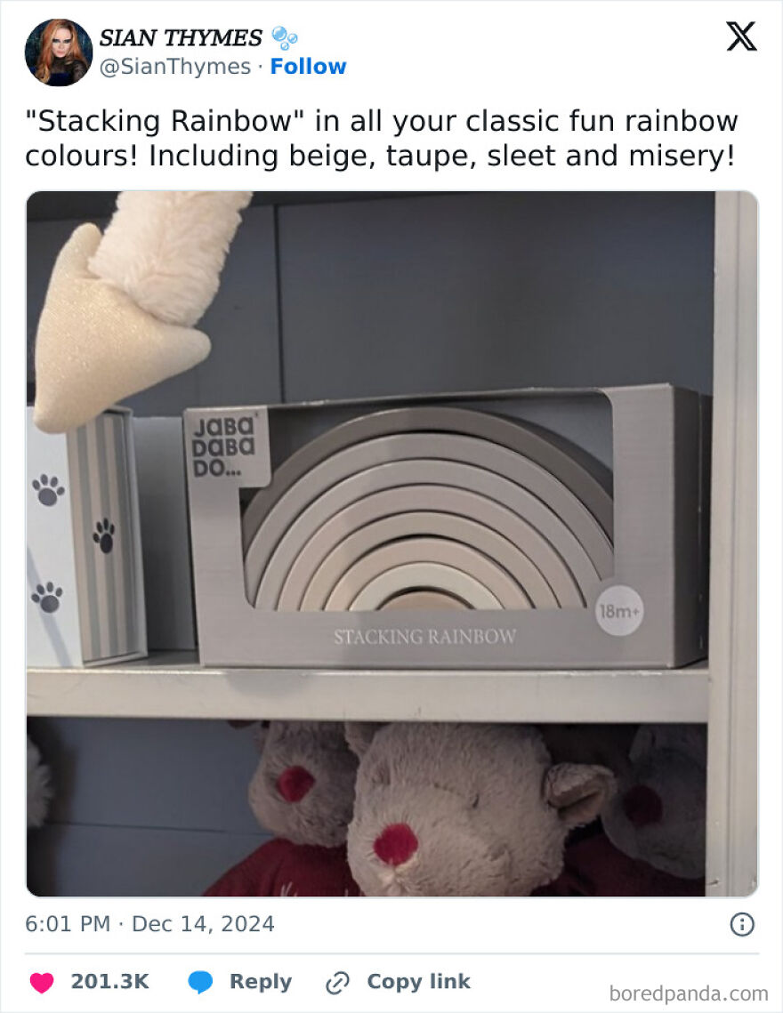 Hilarious meme about a "Stacking Rainbow" toy in dull colors like beige, taupe, and sleet on a shelf.
