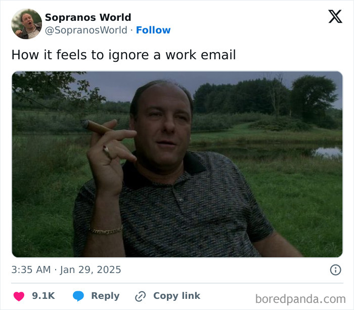 Man in a field smiling with a cigar, embodying work-email-jokes by ignoring a work email.