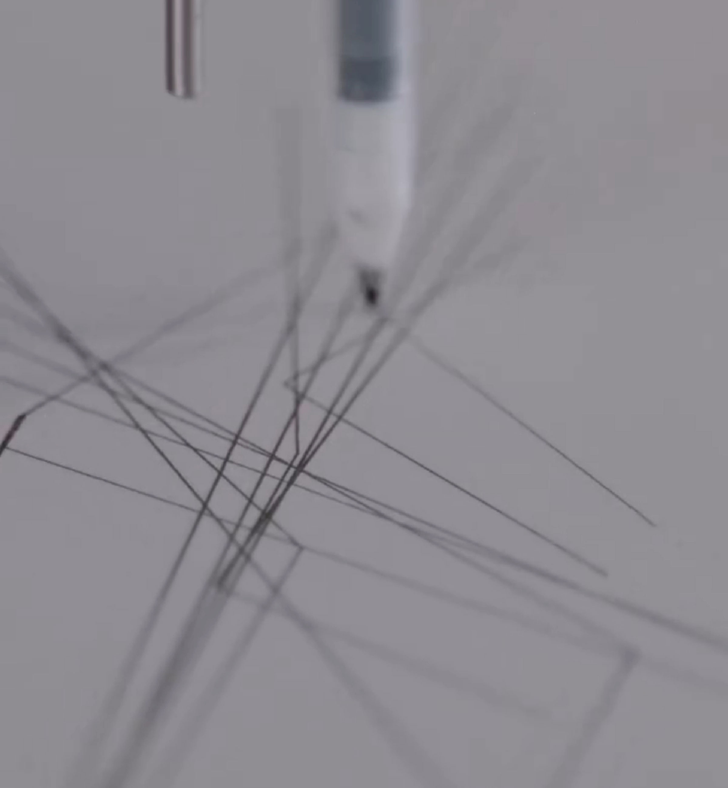 Tattoo machine drawing intricate lines inspired by brain activity imprint. Tattoo machine drawing intricate lines inspired by brain activity imprint.