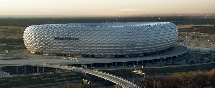 Aerial view of a modern soccer stadium, one of the iconic cathedrals of soccer where legends are born.