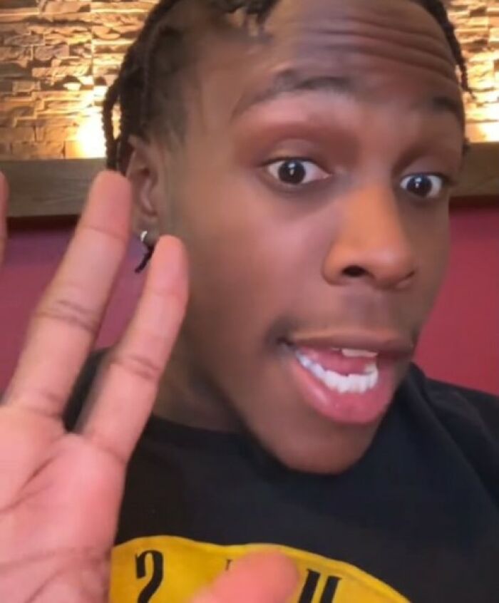 A person discussing parenting, emphasizing the role of being a guide in emotional development. A person discussing parenting, emphasizing the role of being a guide in emotional development.