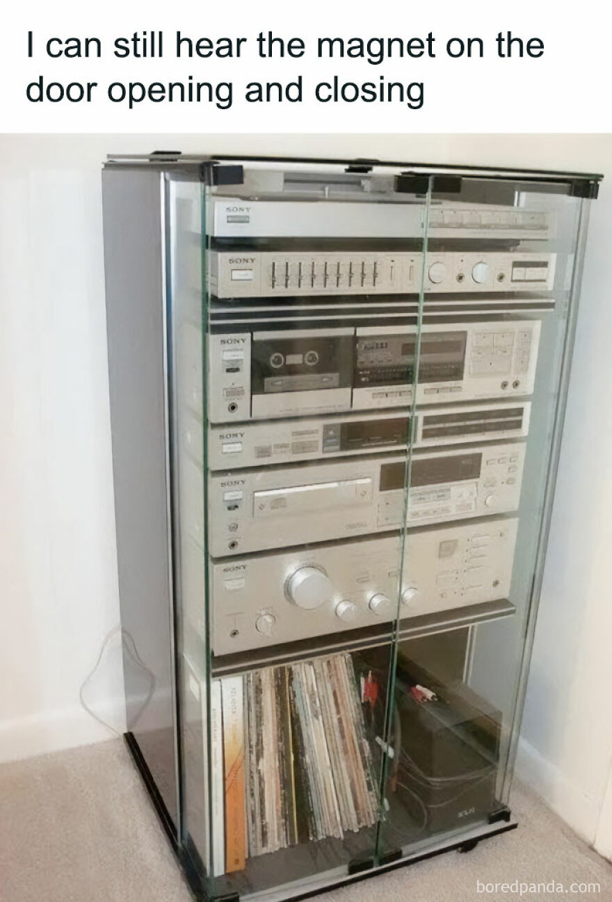 Vintage Hi-Fi stereo in a glass cabinet with records; nostalgic humor evokes memories.