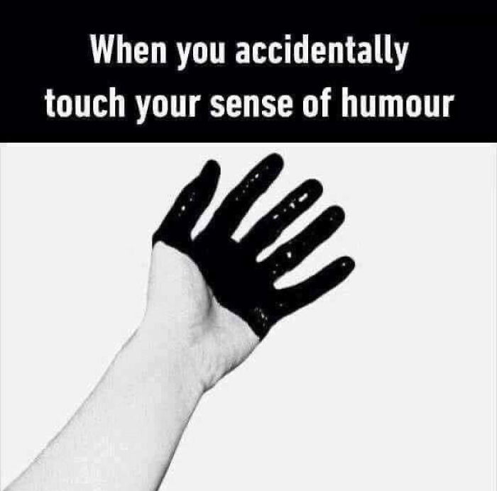 A hand covered in black, illustrating sarcastic humor as witchcraft.