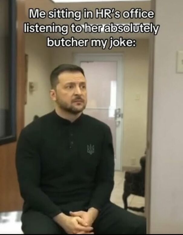 Man in black shirt sitting in an office, humorous caption about HR misunderstanding a joke.