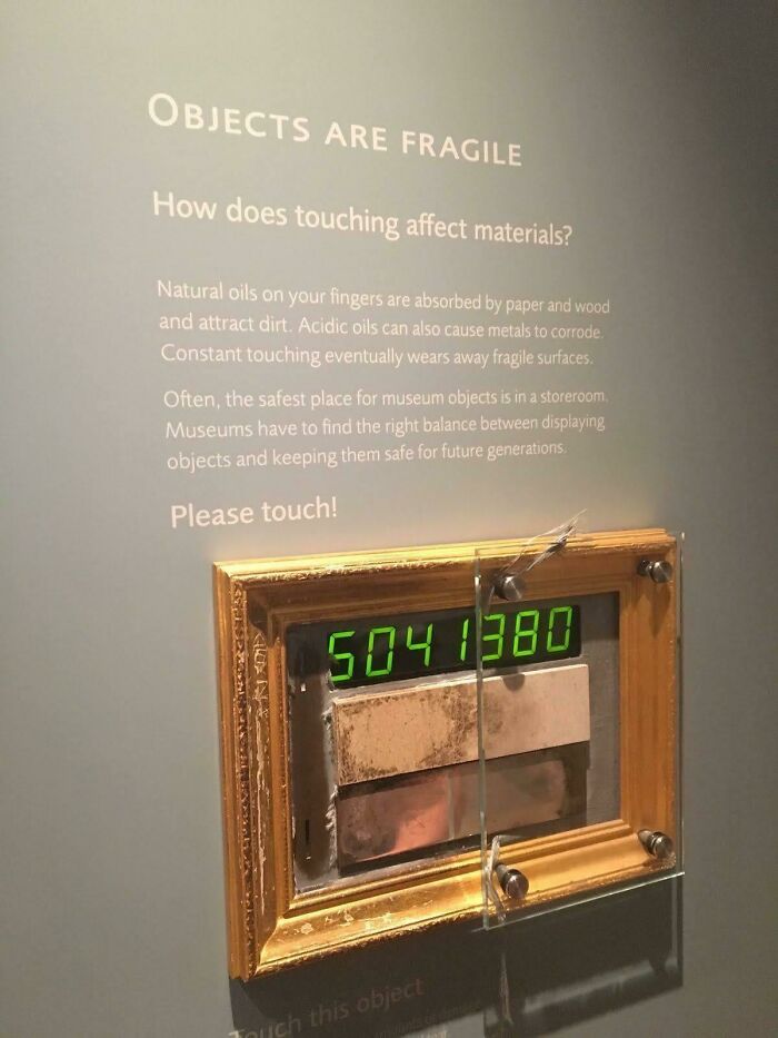 Museum display showing wear on materials over time from touching, illustrating the concept of time vs. things.