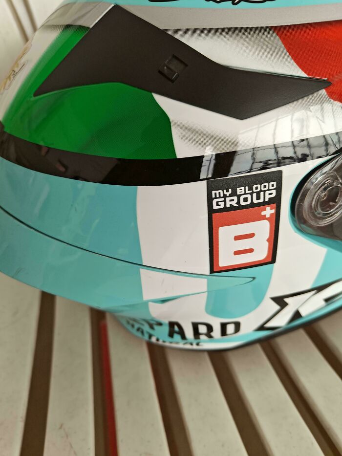 Close-up of a smart and cool helmet design featuring bold colors and a blood group label for safety awareness.