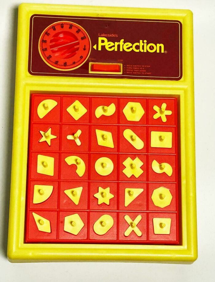 Retro Perfection board game vintage puzzle toy with red and yellow pieces, nostalgic pic from people realizing they’re old now.