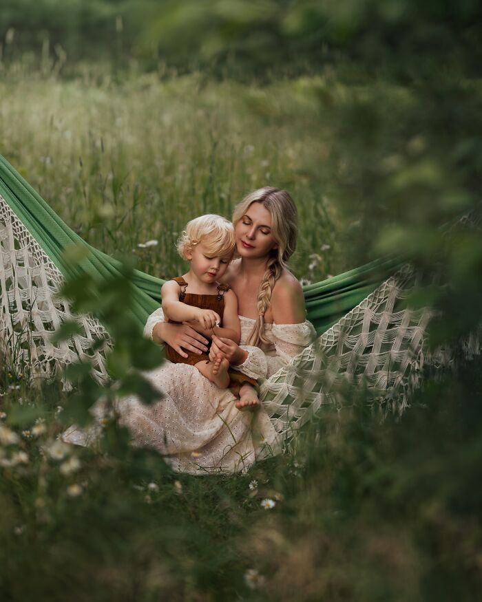Mother and child in nature, capturing the magic of childhood through a mother’s lens in a serene setting.